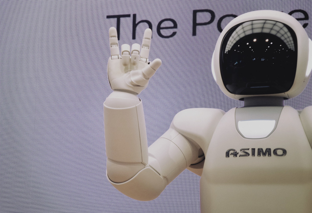 Asimo robot making hand gesture